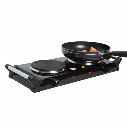 Portable electric cooktop with a frying pan on a white background